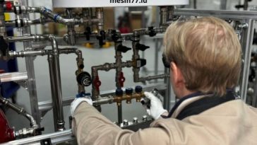sistem cip pada pengisi botol otomatis